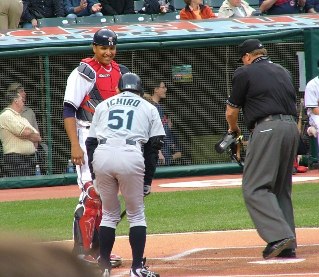 Indians catcher and Ichiro talking