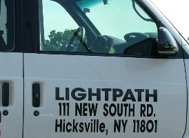 Van that reads from city of Hicksville, NY