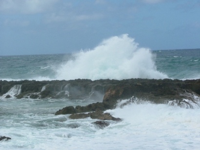 Waves crashing over rocks